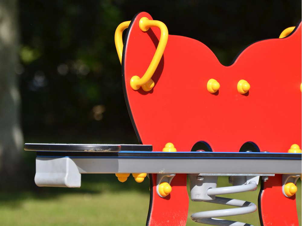 Close up of butterfly spring seesaw