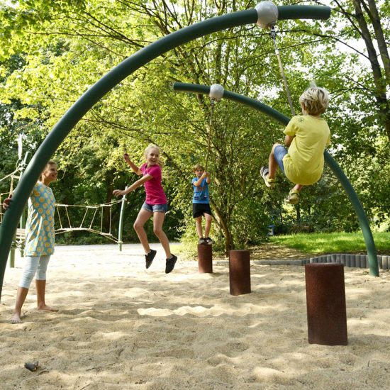 Rope swing in sand pit