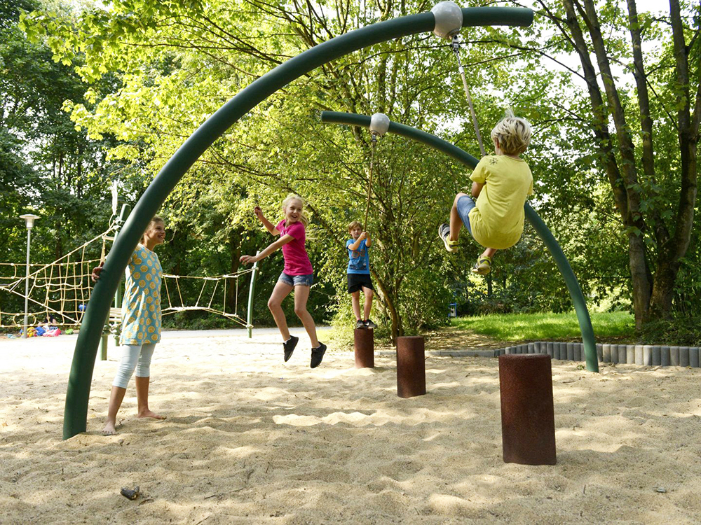 Rope swing in sand pit