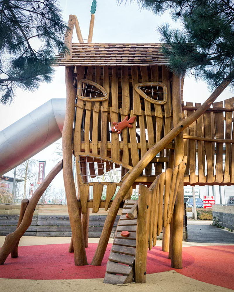 Side view of large timber climbing tower